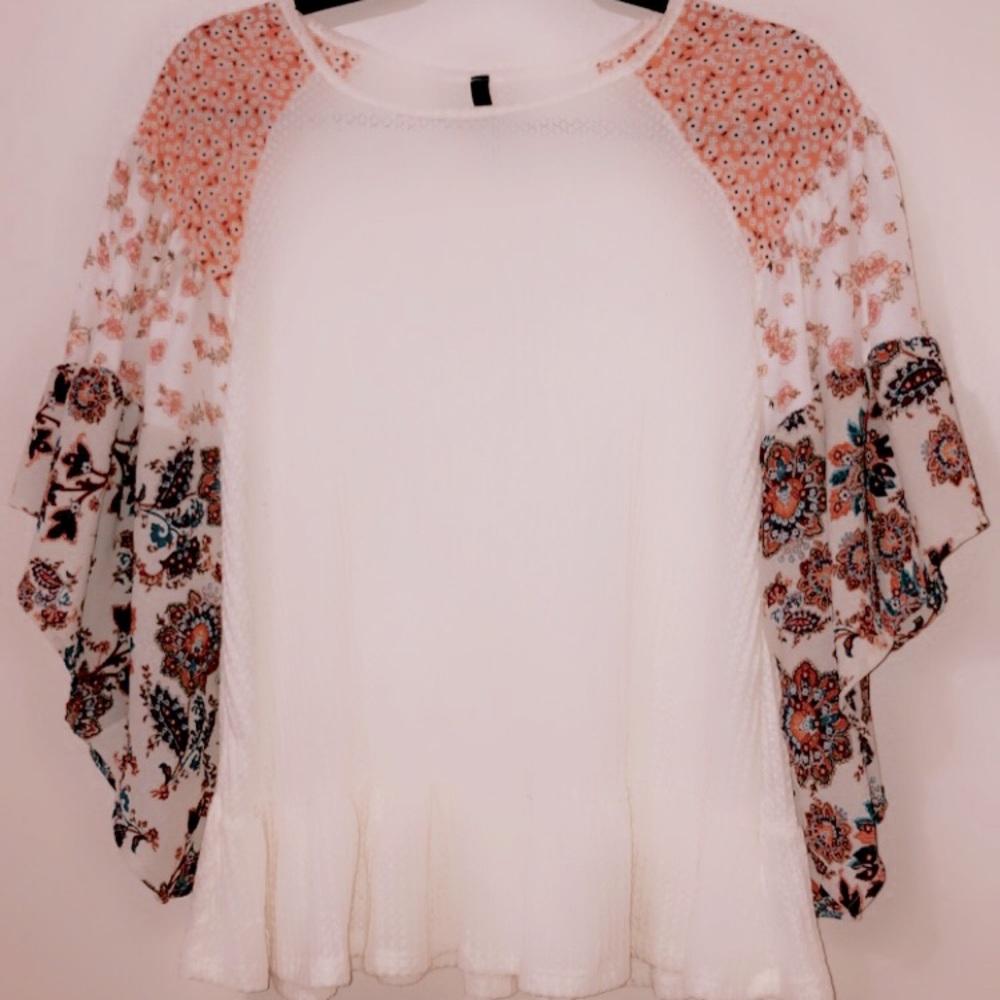 White waffle knit shirt with floral sleeves